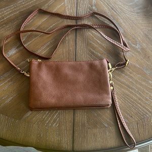 Vegan leather cross body/ clutch. NWOT. All straps are removable